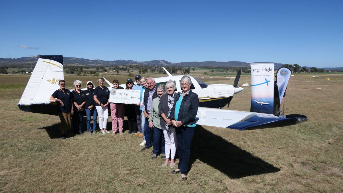 CWA members making a donation to Angel Flight earlier this year. The aerodrome is set to be run by the Friends of Tenterfield Aerodrome group. Picture by Peter Harris.