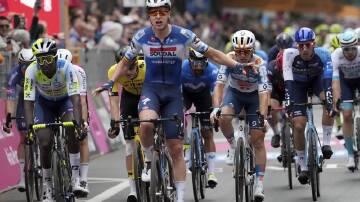Belgium's Tim Merlier wins the third stage of the Giro d'Italia from Novara to Fossano, Italy, (AP PHOTO)
